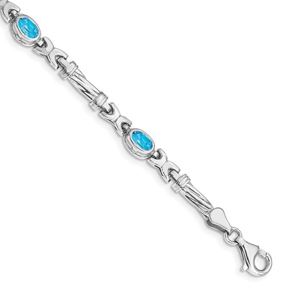 10K White Gold Blue Topaz 4 Stone Bracelet - 7 in. 10K White Gold Blue Topaz 4 Stone Bracelet - 7 in.