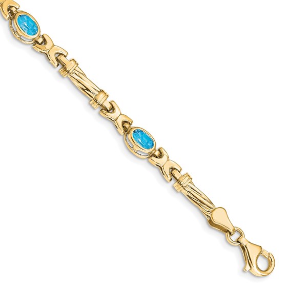 10K Yellow Gold Blue Topaz 4 Stone Bracelet - 7.25 in. 10K Yellow Gold Blue Topaz 4 Stone Bracelet - 7.25 in.