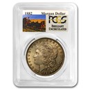 1878-1904 Stage Coach Morgan Dollar BU PCGS (Toned, Random)