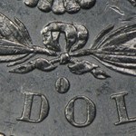 1882-O/S Morgan Dollar AU-58 NGC (VAM-5, Broken S, Top-100)