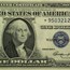 1935-E* $1.00 Silver Certificate AU (Fr#1614*) Star Note